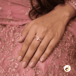 Rose gold criss-cross multi-band ring for women with pavé accent stones and a bezel-set center crystal