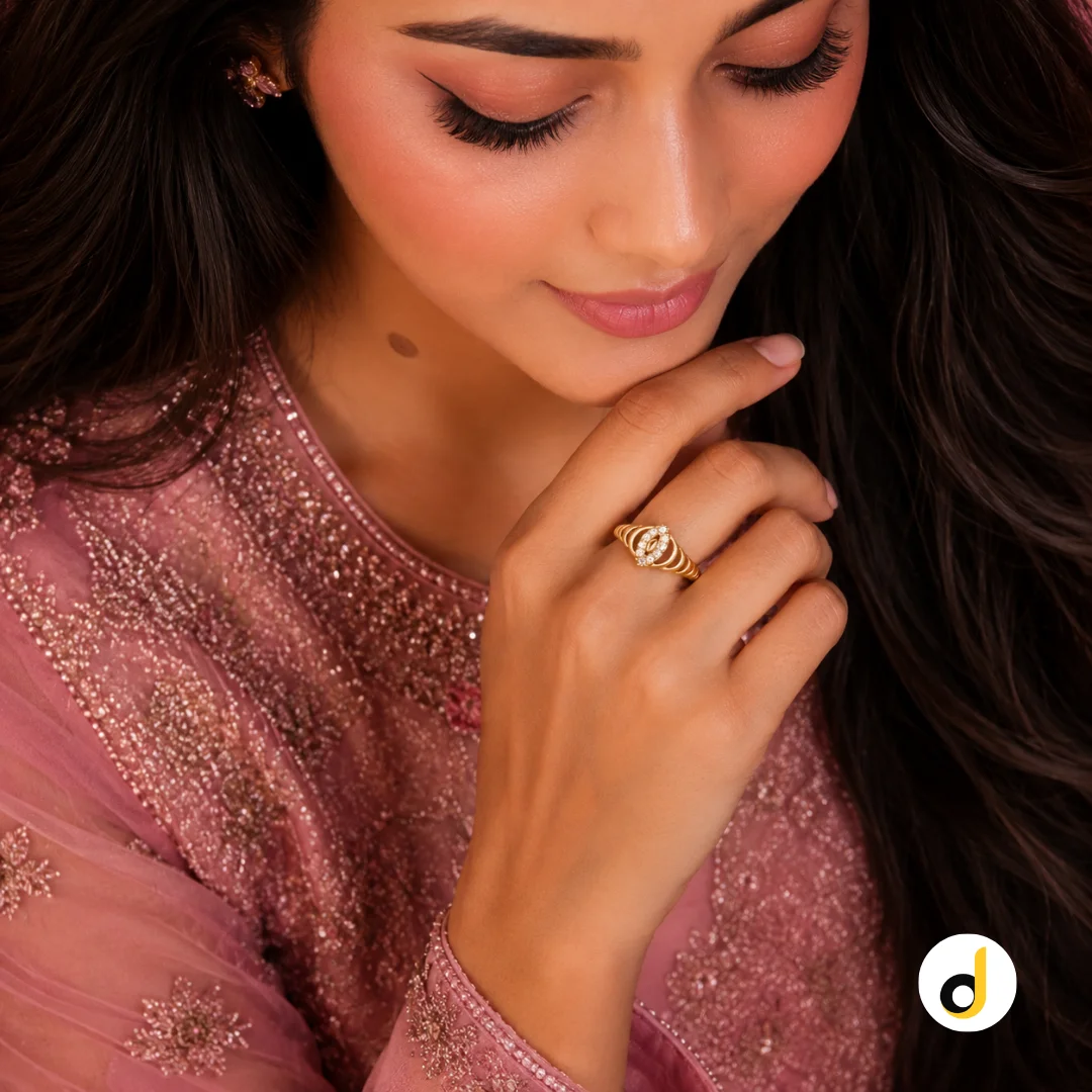 Gold tone marquise ring featuring sparkling embedded accent stones