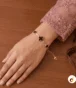 Black enamel clover bracelet for women and girls with gold plated finish